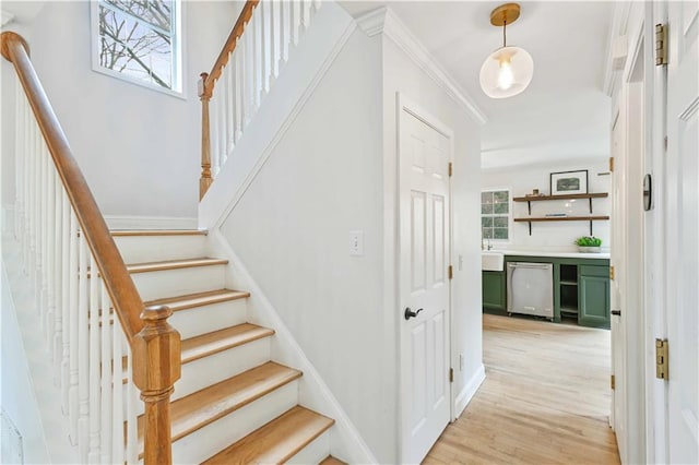 staircase featuring wood finished floors