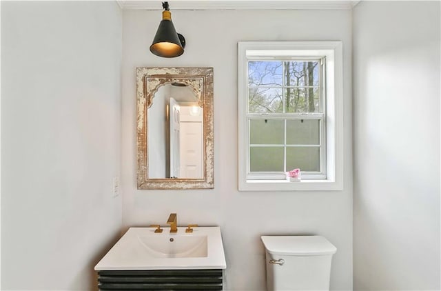 bathroom with vanity and toilet