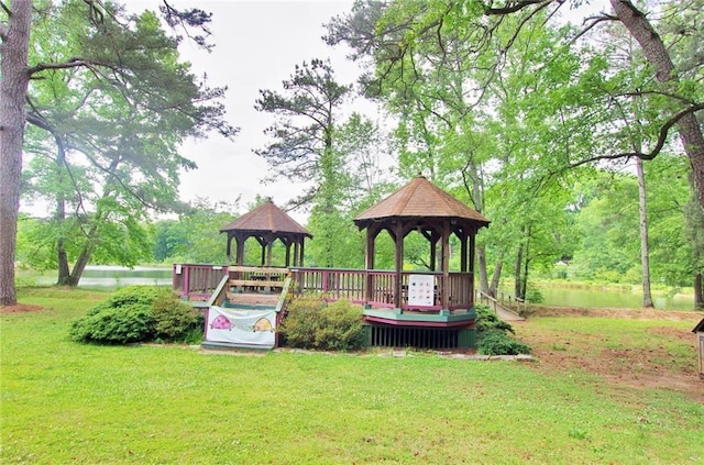 view of playground with a yard and a gazebo