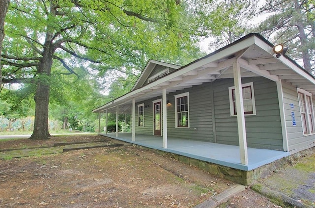 view of home's exterior with covered porch