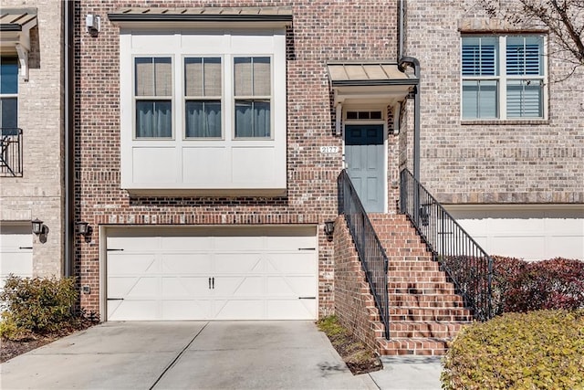 doorway to property featuring a garage