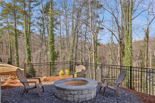 view of patio featuring an outdoor fire pit