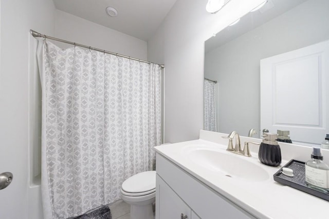 full bath with tile patterned flooring, curtained shower, vanity, and toilet