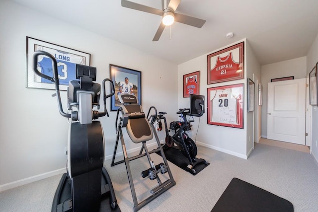 workout room with carpet flooring, ceiling fan, and baseboards