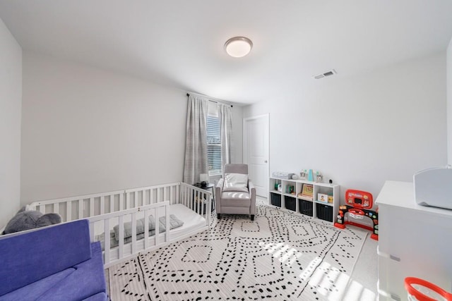 bedroom with visible vents