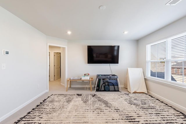 interior space with recessed lighting, visible vents, and baseboards