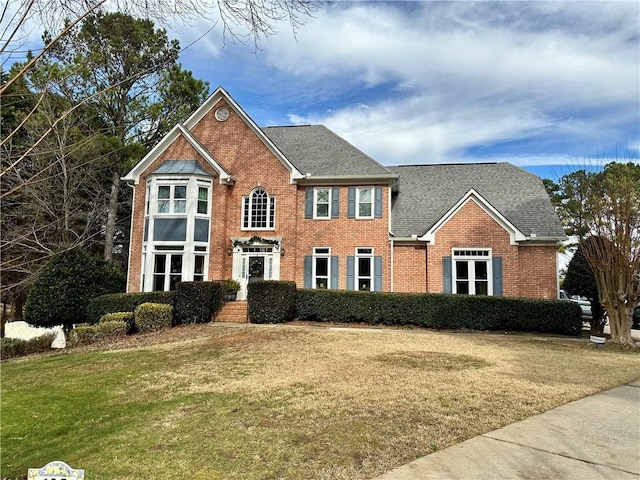 view of front of home featuring a front yard