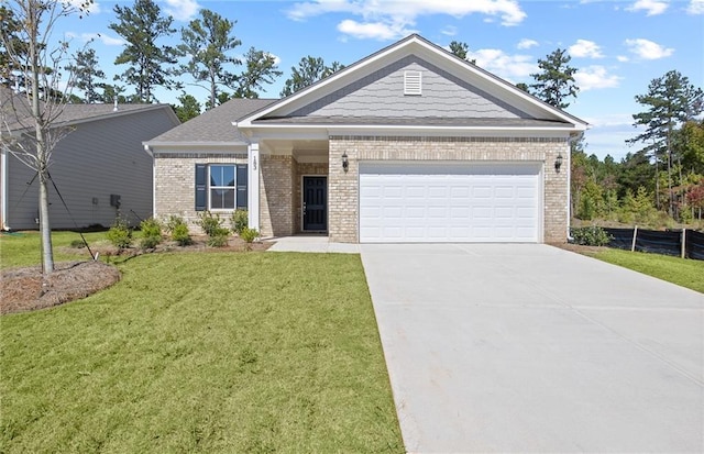 476 Village Ln, Fairburn, GA 30213 - view of front of house with brick siding, a front lawn, concrete driveway, and a garage