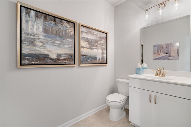 476 Village Ln, Fairburn, GA 30213 - bathroom with vanity, toilet, baseboards, and tile patterned flooring