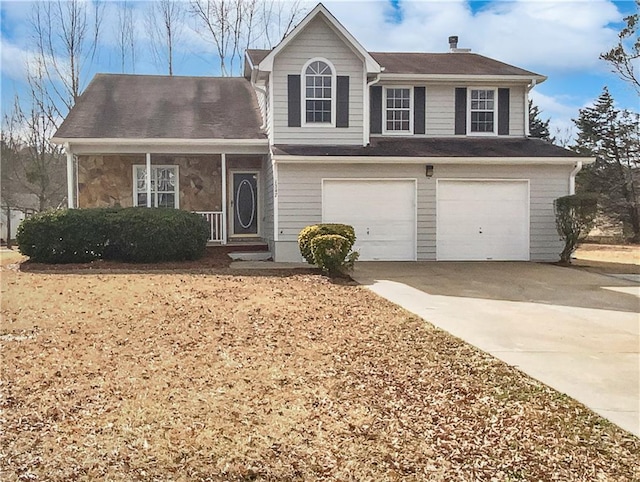 view of front of home with a garage