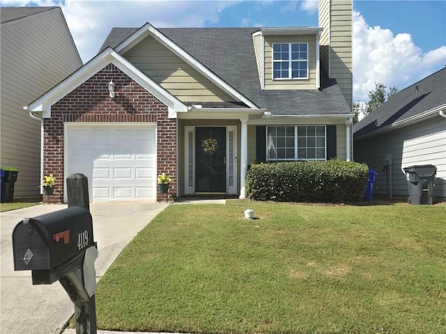 view of front facade featuring a garage and a front yard