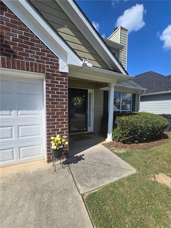 property entrance featuring a garage