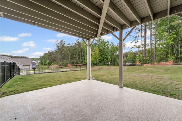 view of patio with view of wooded area