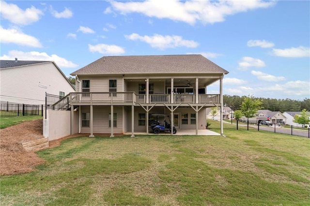 rear view of property featuring a deck, a patio area, and ceiling fan