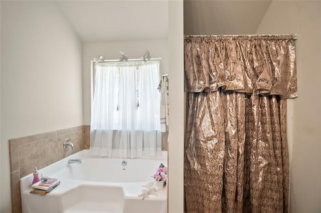 bathroom featuring a garden tub