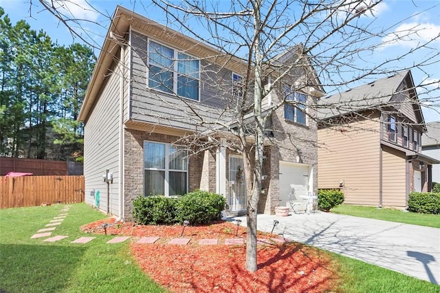 traditional home featuring a garage, brick siding, fence, concrete driveway, and a front lawn