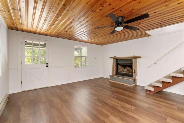 unfurnished living room with hardwood / wood-style floors, ceiling fan, and wooden ceiling