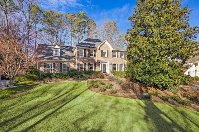 view of front of home with a front lawn