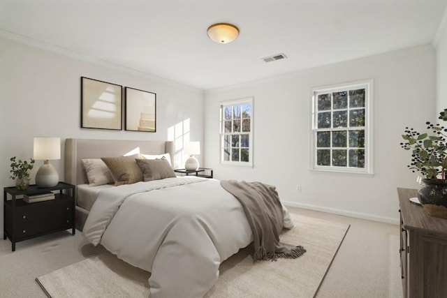 carpeted bedroom with crown molding