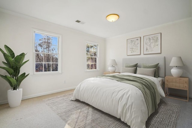 bedroom with carpet flooring and ornamental molding