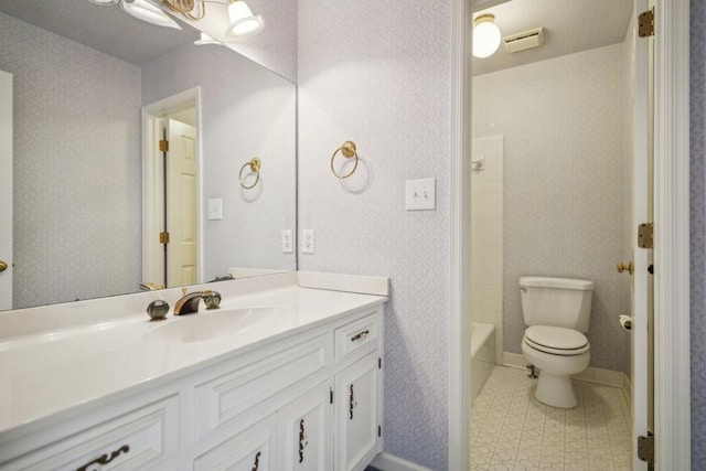 full bathroom with vanity,  shower combination, and toilet