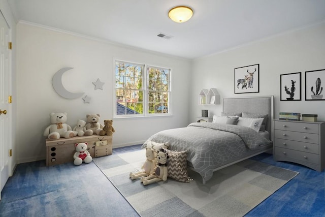 bedroom with carpet floors and ornamental molding