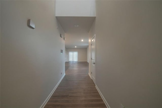 hallway featuring dark hardwood / wood-style floors