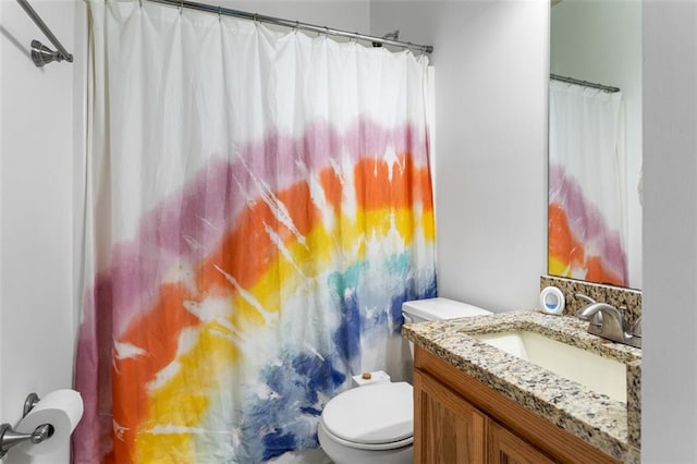 747 Dill Ave SW, Atlanta, GA 30310 - bathroom featuring toilet, vanity, and a shower with curtain