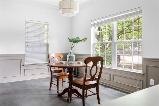 747 Dill Ave SW, Atlanta, GA 30310 - dining room with a decorative wall, wainscoting, and ornamental molding