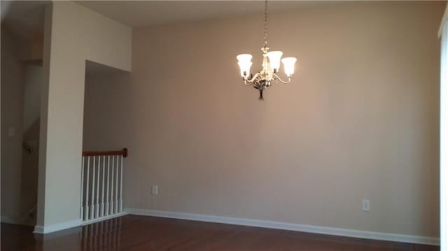 2199 Landing Walk Dr, Duluth, GA 30097 - unfurnished room featuring a chandelier and dark wood-style floors