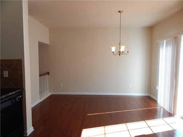 2199 Landing Walk Dr, Duluth, GA 30097 - unfurnished dining area with wood finished floors and a chandelier