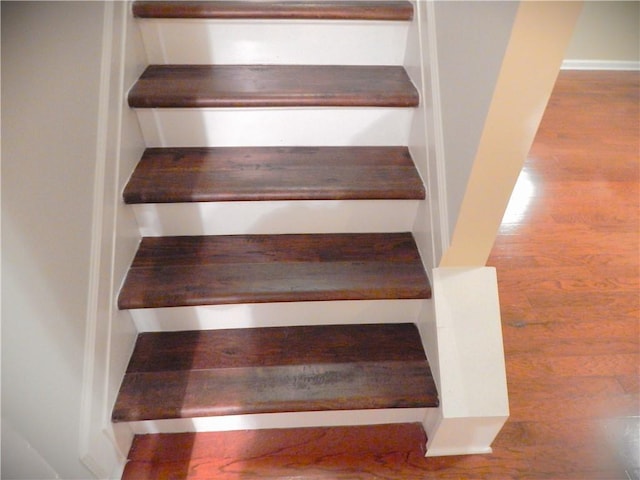 2199 Landing Walk Dr, Duluth, GA 30097 - staircase featuring wood finished floors