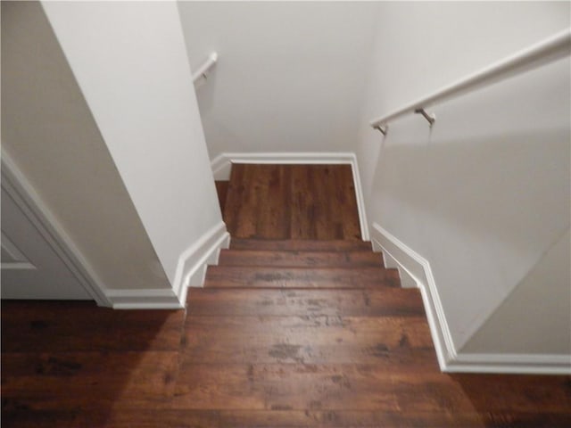 2199 Landing Walk Dr, Duluth, GA 30097 - stairs featuring wood finished floors and baseboards