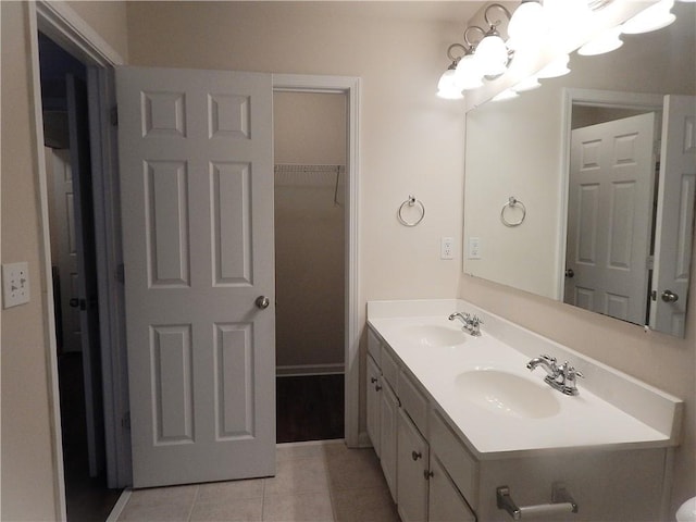 2199 Landing Walk Dr, Duluth, GA 30097 - bathroom with double vanity, tile patterned floors, and a chandelier