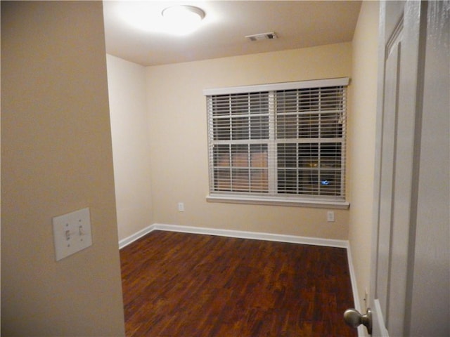 2199 Landing Walk Dr, Duluth, GA 30097 - spare room with baseboards and wood finished floors
