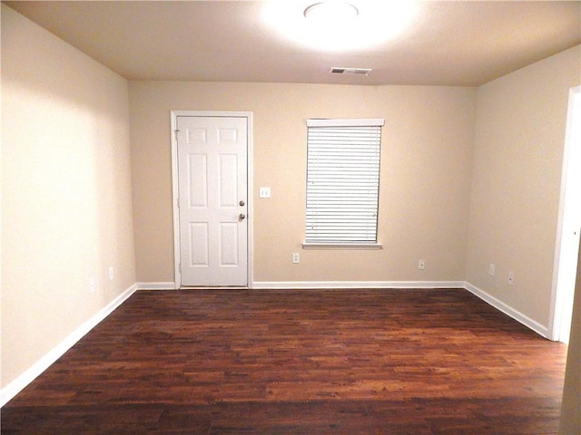 2199 Landing Walk Dr, Duluth, GA 30097 - spare room with dark wood-style flooring and baseboards