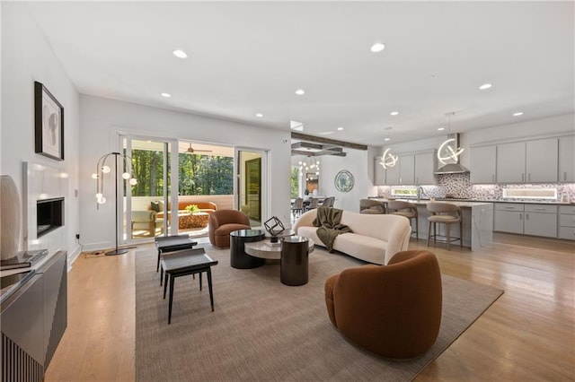 living room with light hardwood / wood-style floors