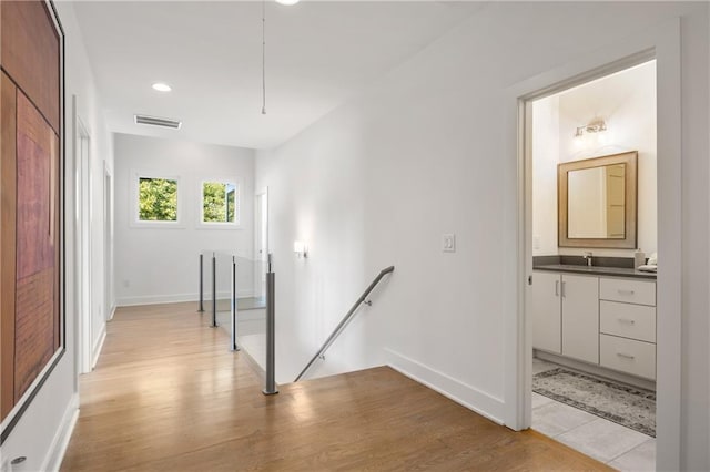 hallway featuring light hardwood / wood-style floors