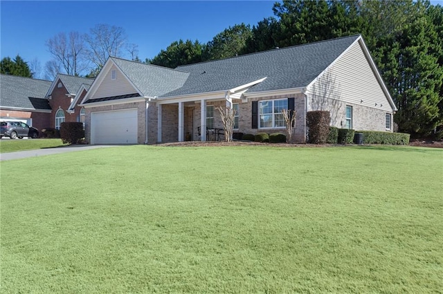 ranch-style house with a garage and a front lawn