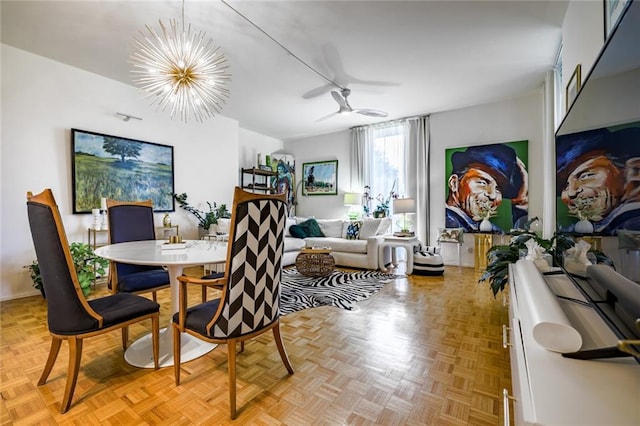 130 26th St NW Unit 701, Atlanta, GA 30309 - dining space featuring a ceiling fan and a chandelier