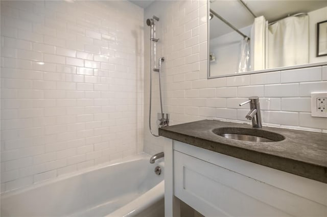 130 26th St NW Unit 701, Atlanta, GA 30309 - full bath with shower / tub combo with curtain, decorative backsplash, and vanity
