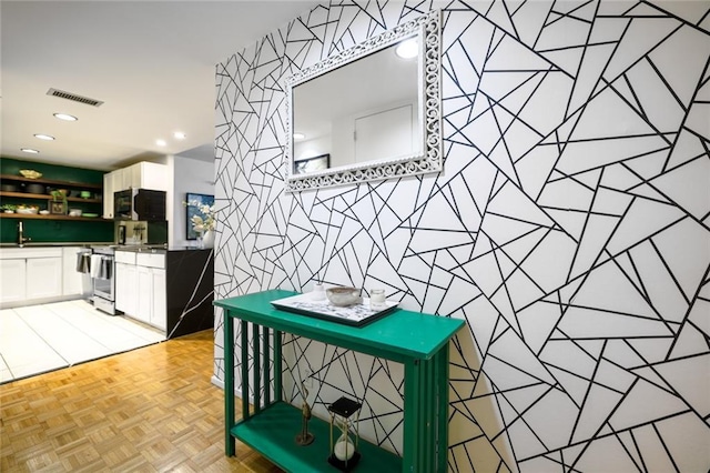 130 26th St NW Unit 701, Atlanta, GA 30309 - detailed view of a sink and recessed lighting