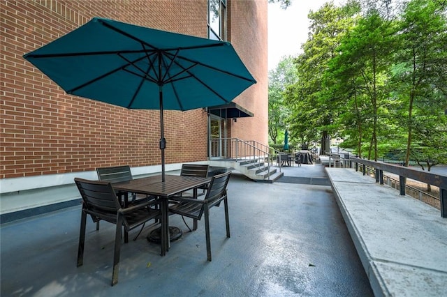 130 26th St NW Unit 701, Atlanta, GA 30309 - view of patio with outdoor dining space
