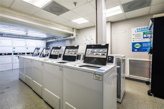 130 26th St NW Unit 701, Atlanta, GA 30309 - community laundry with washer and dryer and light floors