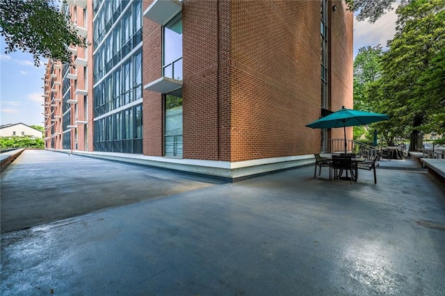 130 26th St NW Unit 701, Atlanta, GA 30309 - view of patio / terrace featuring outdoor dining area