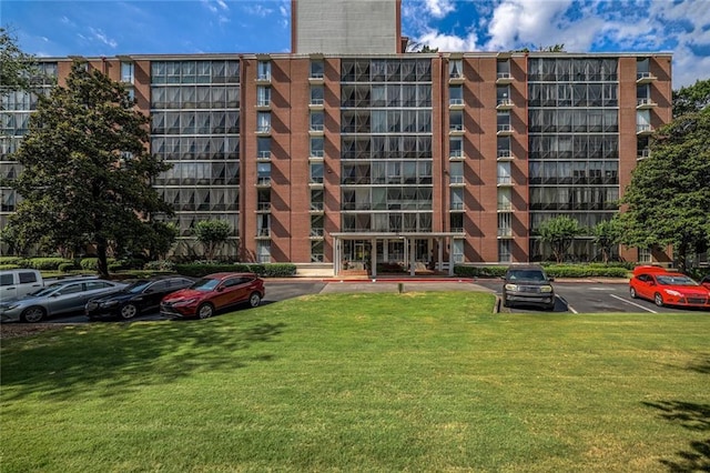 130 26th St NW Unit 701, Atlanta, GA 30309 - view of apartment building / complex featuring uncovered parking