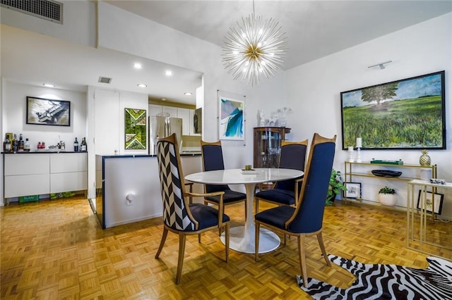 130 26th St NW Unit 701, Atlanta, GA 30309 - dining room with a chandelier and recessed lighting