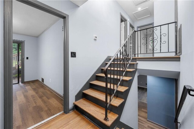 3664 Pin Oak Cir, Atlanta, GA 30340 - stairway with wood finished floors and baseboards