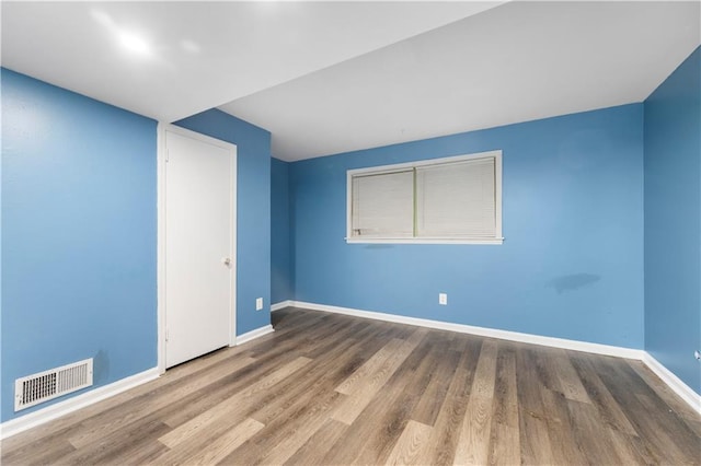 3664 Pin Oak Cir, Atlanta, GA 30340 - unfurnished room with baseboards and wood finished floors