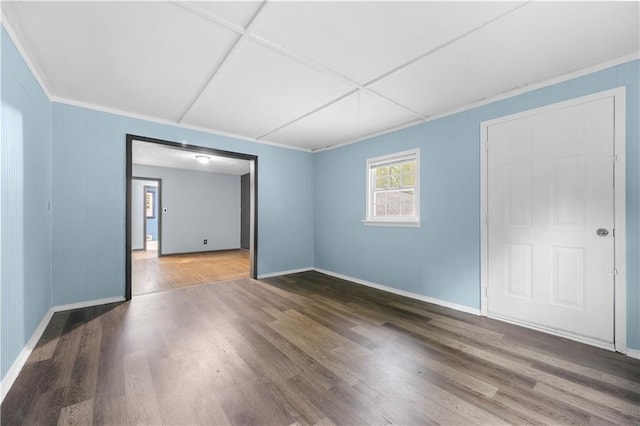 3664 Pin Oak Cir, Atlanta, GA 30340 - spare room featuring baseboards, wood finished floors, and ornamental molding